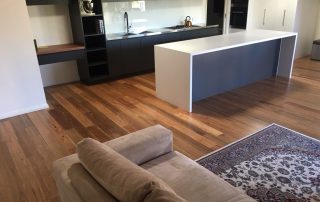 modern timber floor kitchen lounge